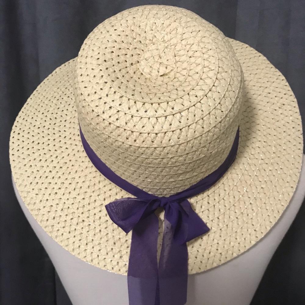 Soft straw/looking hat with purple ribbon